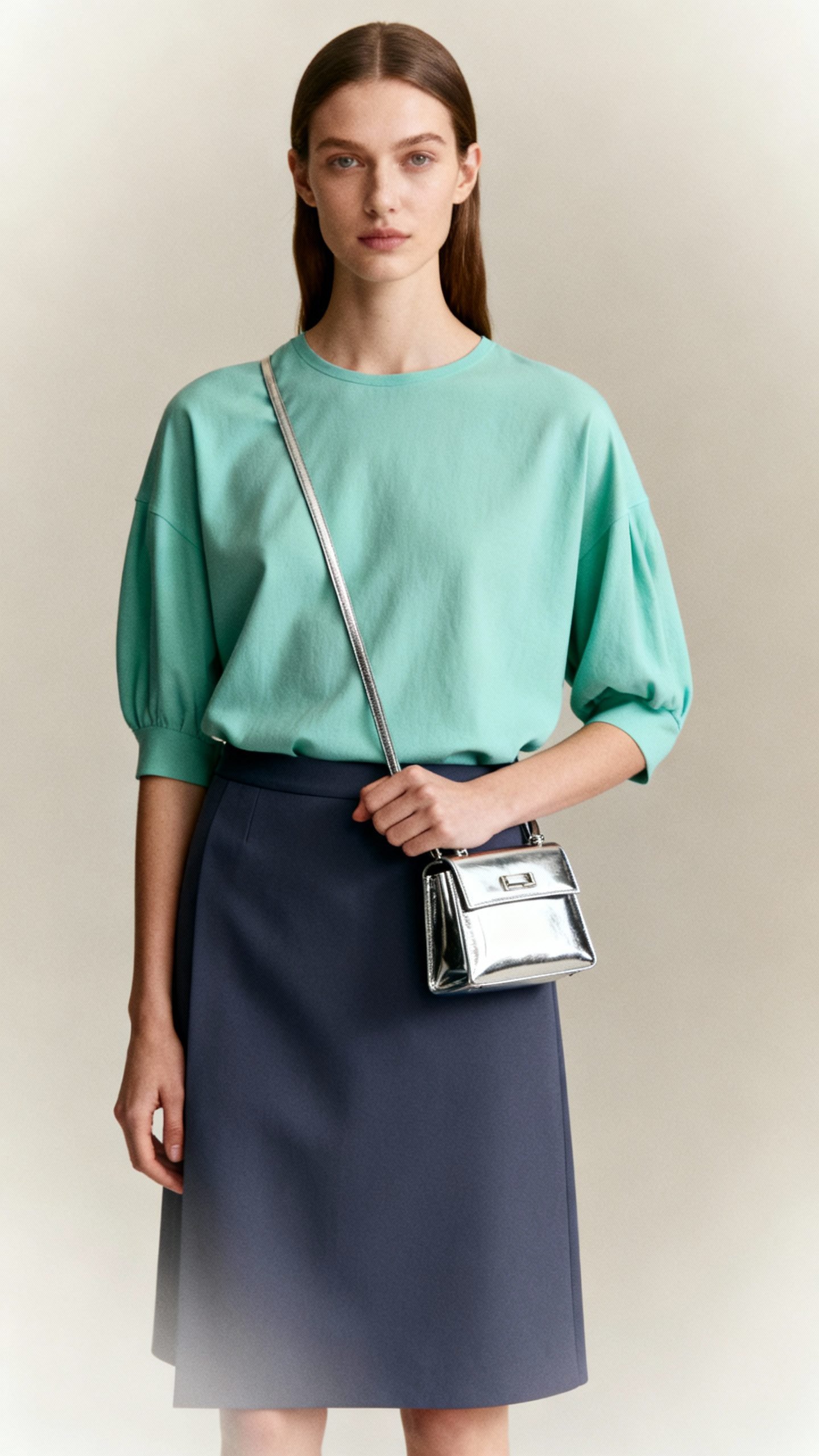 Seafoam top with chrome mini bag, dusty navy skirt